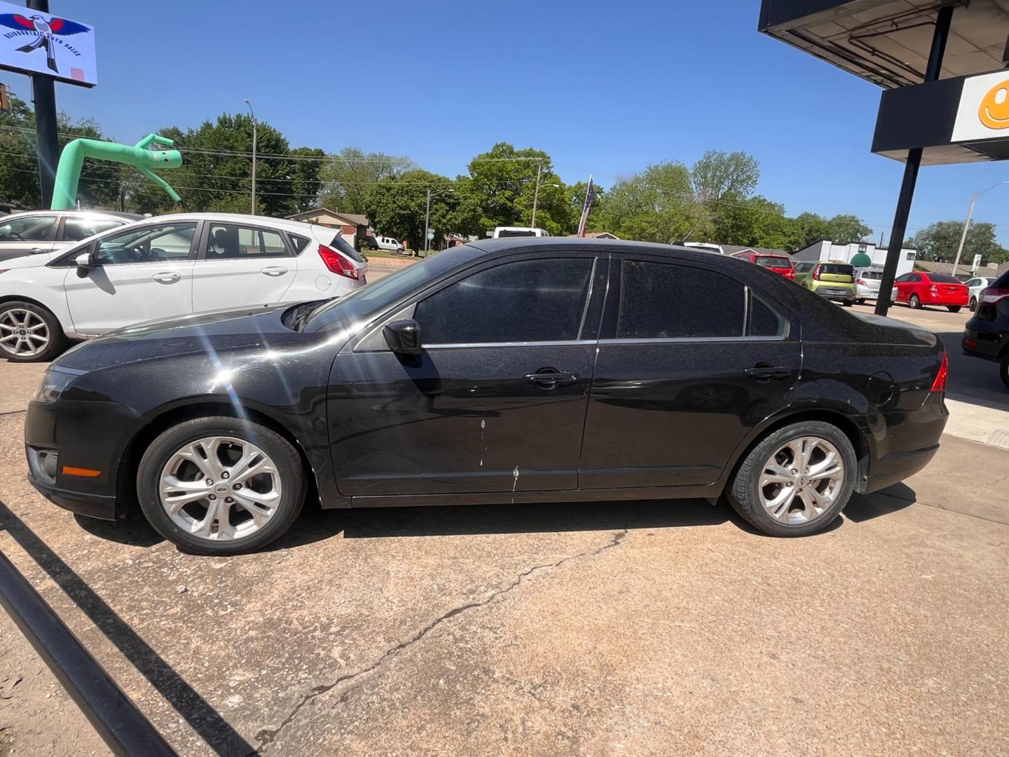 2012 BLACK FORD FUSION SE SE (3FAHP0HAXCR) with an 2.5L L4 DOHC 16V engine, located at 8101 E. Skelly Dr., Tulsa, OK, 74129, (918) 592-3593, 36.121891, -95.888802 - Photo#1